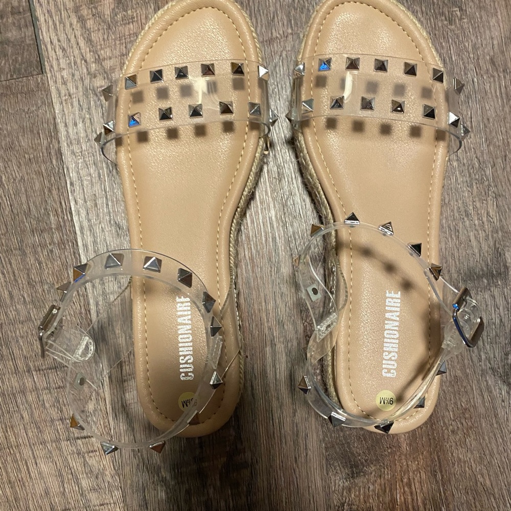 Clear sandals that have never been worn